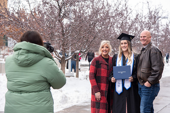 Graduates receive their diplomas during Performing and Visual Arts convocation.