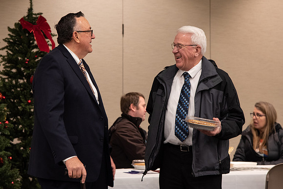 BYU-Idaho Employees enjoy a Christmas gathering in the Taylor Building.
