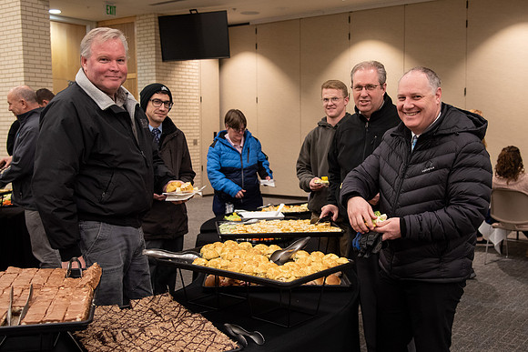BYU-Idaho Employees enjoy a Christmas gathering in the Taylor Building.