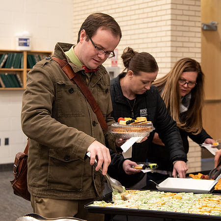 BYU-Idaho Employees enjoy a Christmas gathering in the Taylor Building.