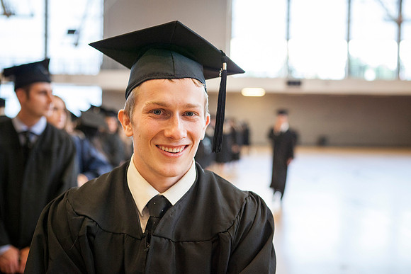 Students gather in the I-Center before Commencement begins.