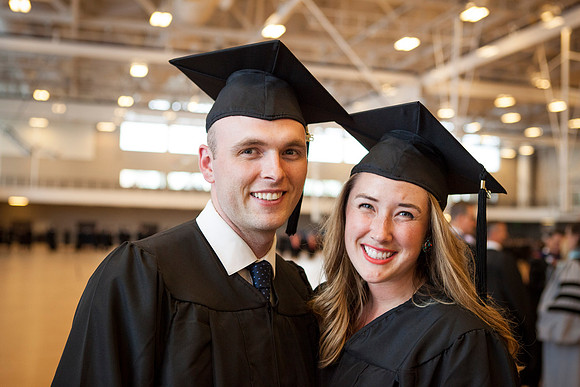 Taylor and Kelsey Skinner gather in the I-Center just before Commencement begins.