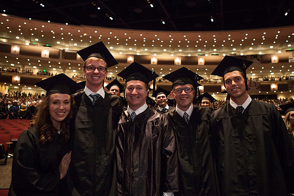 Students gather in the I-Center before Commencement begins. Photo by Tyler Rickenbach