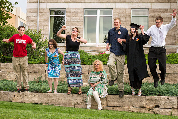 Graduates gather on the BYU-Idaho campus with their family outside, after the Commencement Ceremony in the I-Center. Photo by Tyler Rickenbach