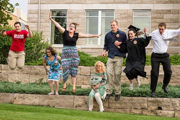Graduates gather on the BYU-Idaho campus with their family outside, after the Commencement Ceremony in the I-Center. Photo by Tyler Rickenbach