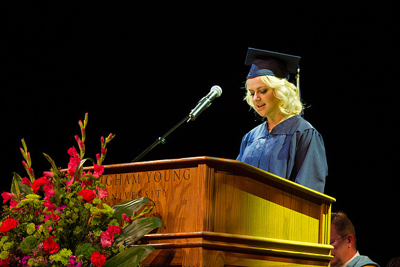 Teresa Barbre gives a Scripture Reading during Convocation in the Kirkham Auditorium. Photo by Tyler Rickenbach
