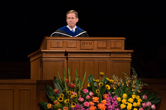 Mark B. Woodruff, Assistant to the Commissioner of Education and Secretary to the Boards, speaks at graduation commencement services.