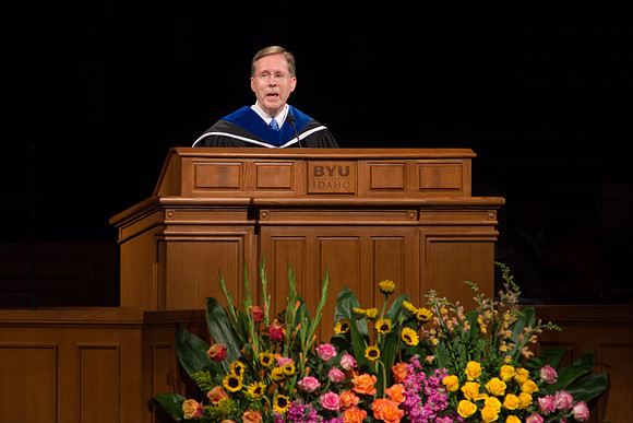 Mark B. Woodruff, Assistant to the Commissioner of Education and Secretary to the Boards, speaks at graduation commencement services.