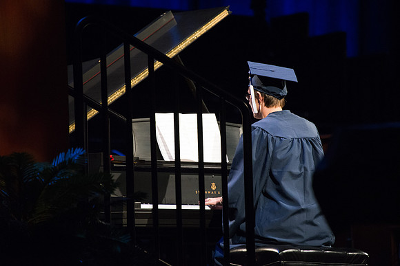 Cammie Holley Bowen, Nursing Graduate, plays a musical number.