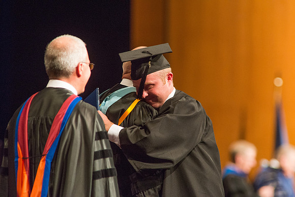 Graduates of the College of Agriculture and LIfe Sciences receive their diplomas.