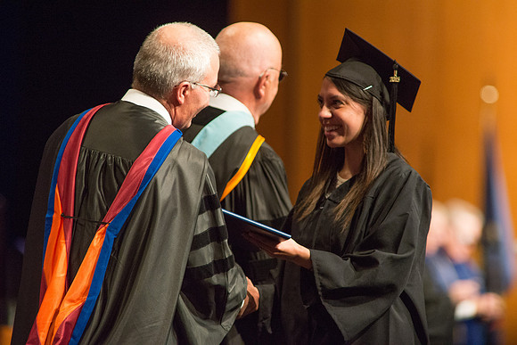 Graduates of the College of Agriculture and LIfe Sciences receive their diplomas.
