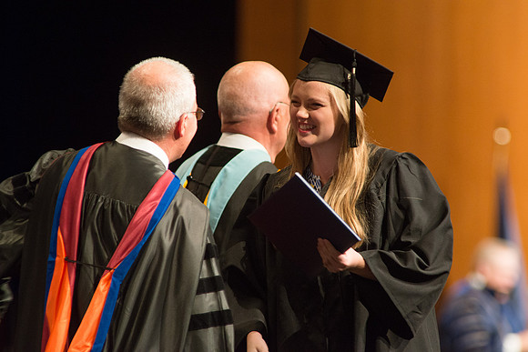 Graduates of the College of Agriculture and LIfe Sciences receive their diplomas.
