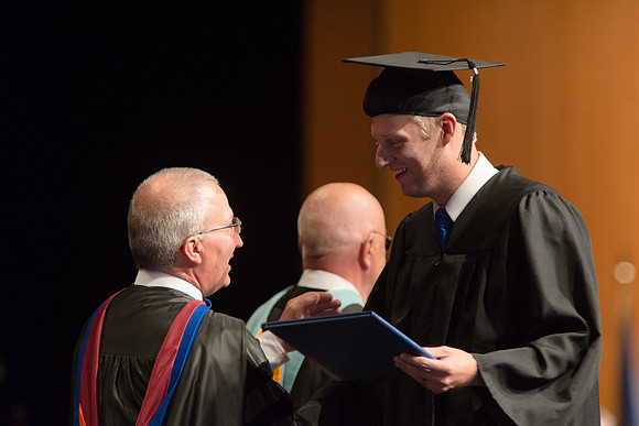 Graduates of the College of Agriculture and LIfe Sciences receive their diplomas.