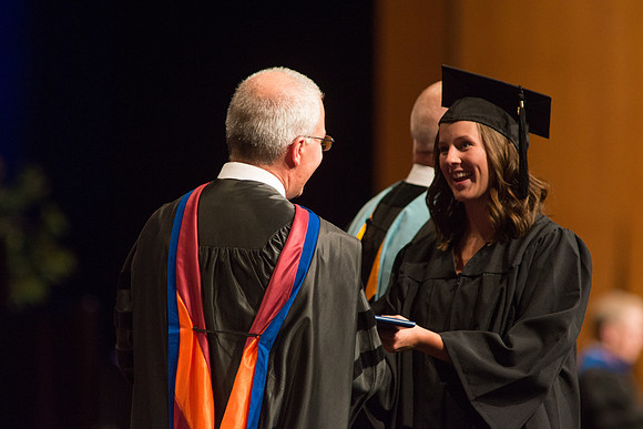 Graduates of the College of Agriculture and LIfe Sciences receive their diplomas.