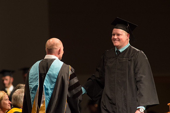 Graduates of the College of Agriculture and LIfe Sciences receive their diplomas.
