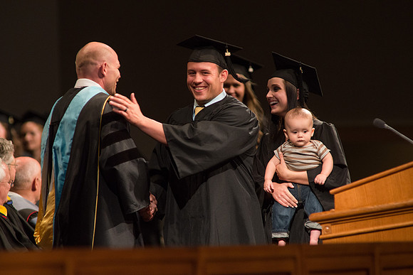Graduates of the College of Agriculture and LIfe Sciences receive their diplomas.
