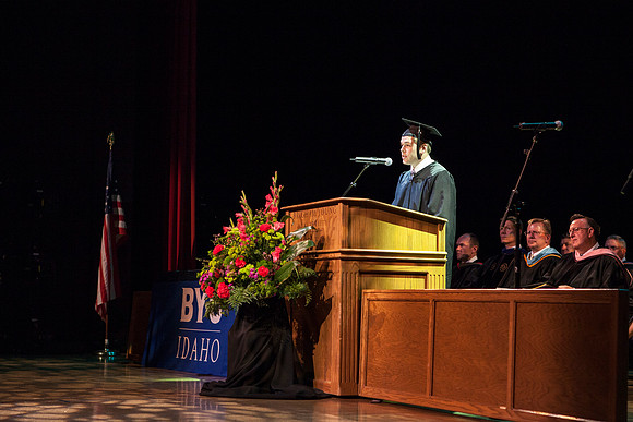 Jared Luke, a Student Speaker during Convocation, talks to graduates in the Kirkham Auditorium. Photo by Tyler Rickenbach