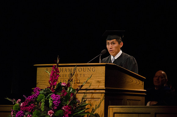 Martin Quito speaks at the College of Business and Communication Covocation ceremony.