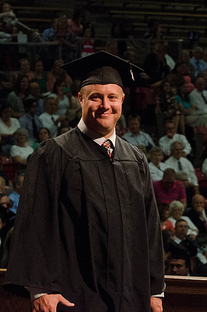 Students recieve their Diplomas during the College of Business and Communication Convocation.