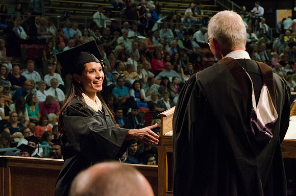 Venezuelan Pathway student Carolina Galvis recieves her diploma in Business Management.