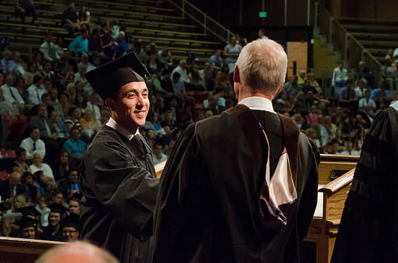 Students recieve their Diplomas during the College of Business and Communication Convocation.