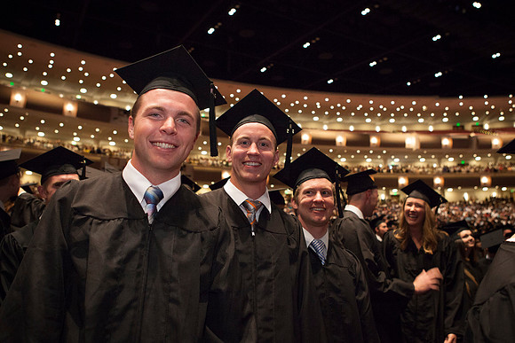 Students gather in the I-Center before Commencement begins. Photo by Tyler Rickenbach