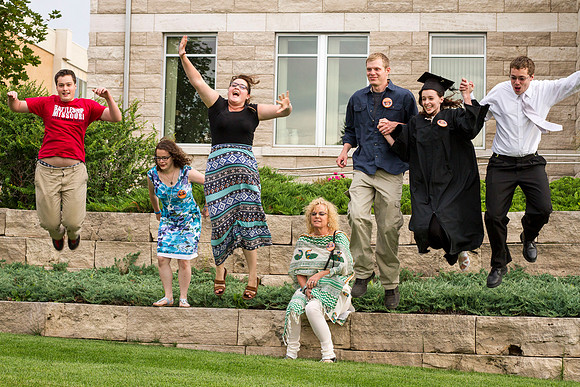 Graduates gather on the BYU-Idaho campus with their family outside, after the Commencement Ceremony in the I-Center. Photo by Tyler Rickenbach