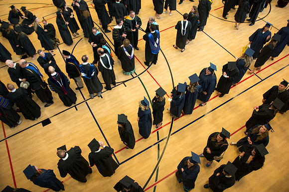 Graduates waiting before commencement ceremony. Photo by Ryan Chase.