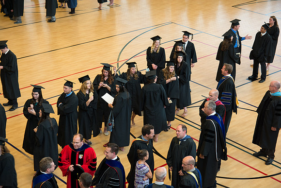 Graduates waiting before commencement ceremony. Photo by Ryan Chase.