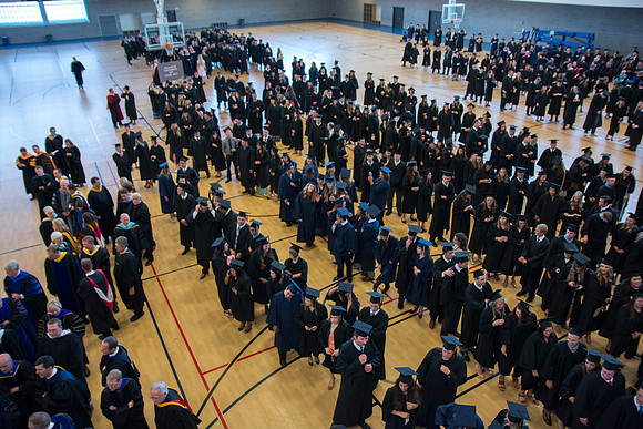 Graduates waiting before commencement ceremony. Photo by Ryan Chase.