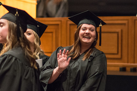 Brigham Young University-Idaho graduates give thanks to parents and teachers at Commencement ceremony. Photo by Ryan Chase