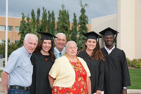 Graduates with their families at Brigham Young University-Idaho.