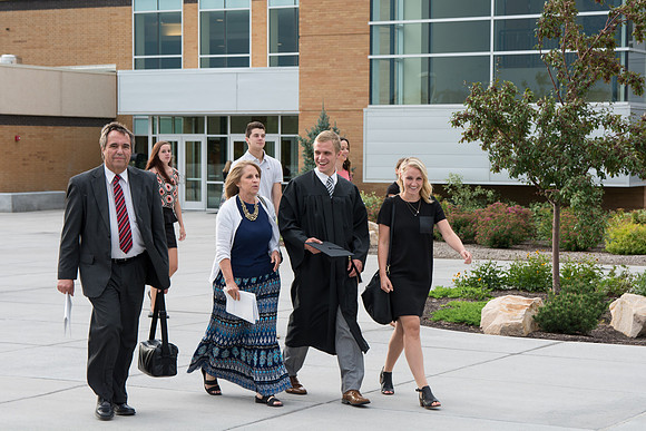 Graduates with their families at Brigham Young University-Idaho.