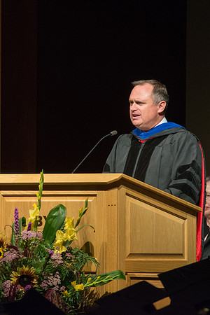 Scott Galer, of the College of Language and Letters, addresses graduatesof the College of Laguage and Letters. Photo by Ryan Chase.