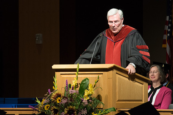 Edwin A. Sexton, Assosiate Academic Vice President for Cirriculum and Online Learning, addresses graduates of the College of Laguage and Letters. Photo by Ryan Chase.