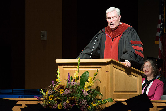 Edwin A. Sexton, Assosiate Academic Vice President for Cirriculum and Online Learning, addresses graduates of the College of Laguage and Letters. Photo by Ryan Chase.