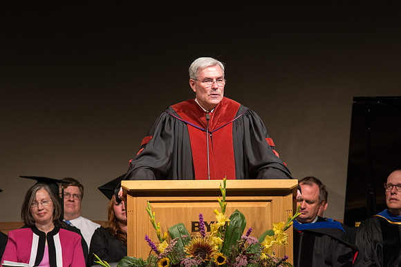 Edwin A. Sexton, Assosiate Academic Vice President for Cirriculum and Online Learning, addresses graduates of the College of Laguage and Letters. Photo by Ryan Chase.
