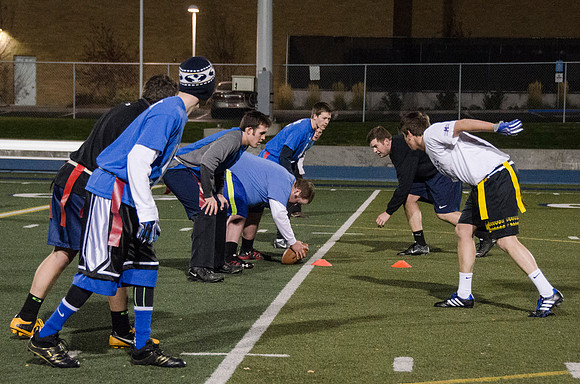 Students play game for advanced men's football