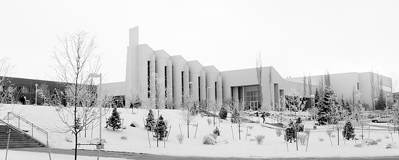 Students on campus during winter in front of Taylor building