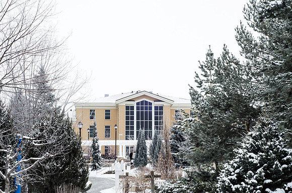 Winter scenes on campus with fresh fallen snow, Hinckley building