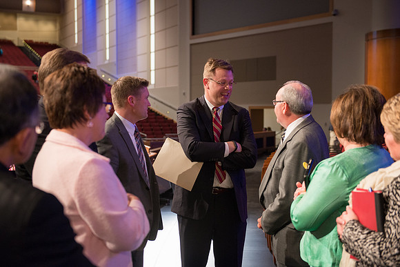 Clark G. Gilbert greets old friends on stage after the devotional. BYU-Idaho photo by Michael Lewis