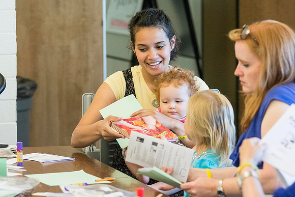 Students make their journals in Sister Leslie Twitchell's class "Make-and-Take Journals'. Photo by Erik Hill.
