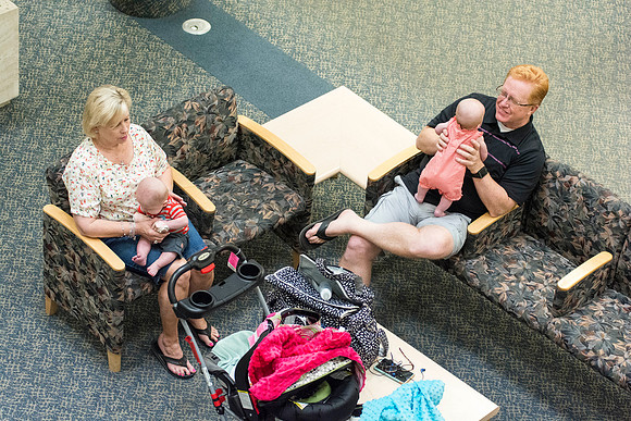 Grandparents care for twins as the parents attend class. BYU-Idaho Education Week is a family affair. Photo by Erik Hill.