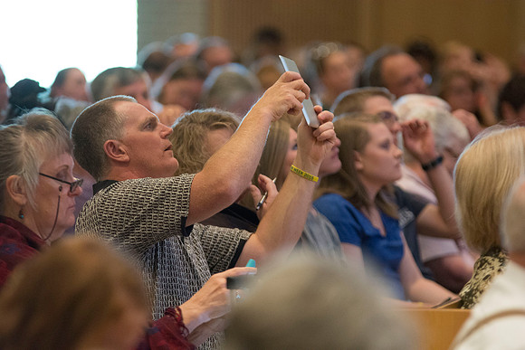 The new age of note taking. Sometimes taking a picture is easier than writing it down. Photo by Erik Hill.