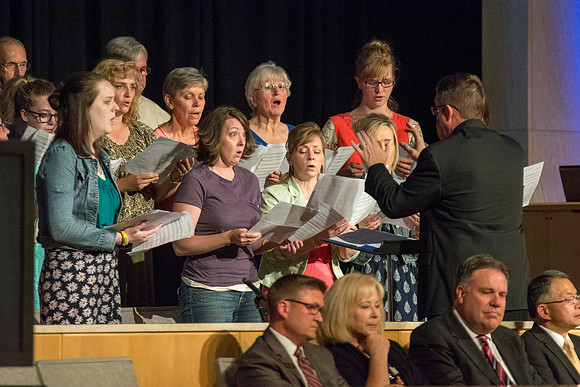 During the week, students attended a class devoted to preparing a musical numnber for the closing devotional. The students perform with Brad Wilcox on the stand. Photo by Erik Hill.