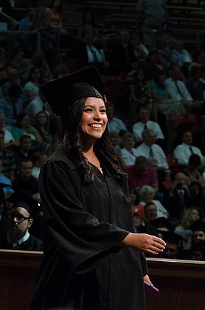Students recieve their Diplomas during the College of Business and Communication Convocation.