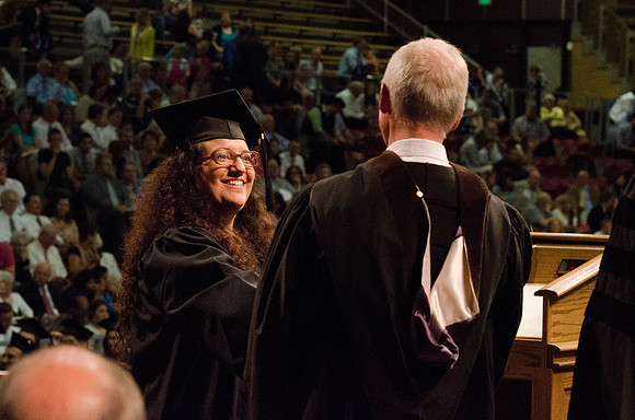Students recieve their Diplomas during the College of Business and Communication Convocation.