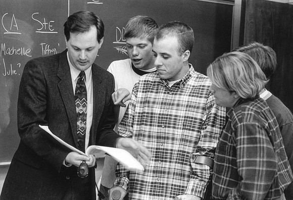 Communications students work alongside their instructor, Eric Embree.