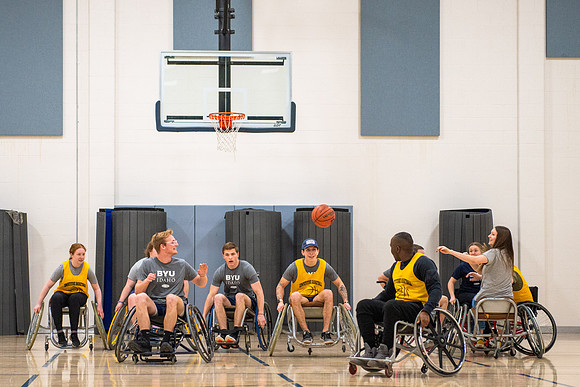 Students participate of Wheelchair Basketball in the Hart Gym.