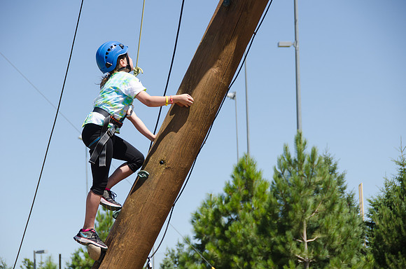 BYU-Idaho Education Week: Strengthening individual and families through lifelong learning. Youth enjoy a little adventure at the Ropes Course.